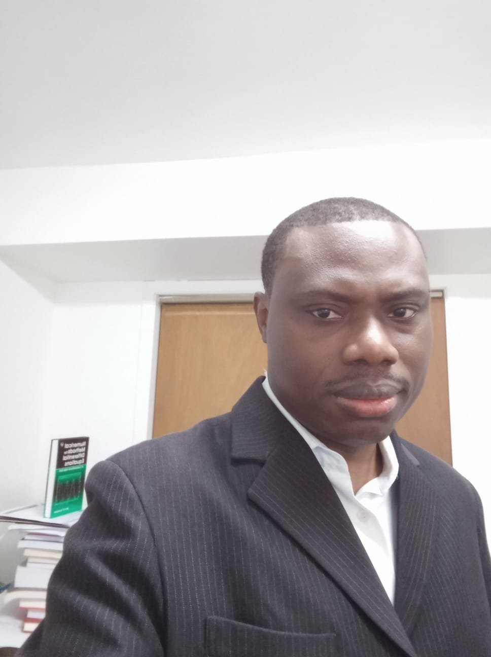 Dr. Claude AHOUANGNINOU